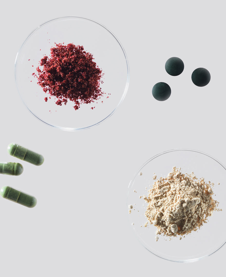 A selection of powder and tablet form of superfoods